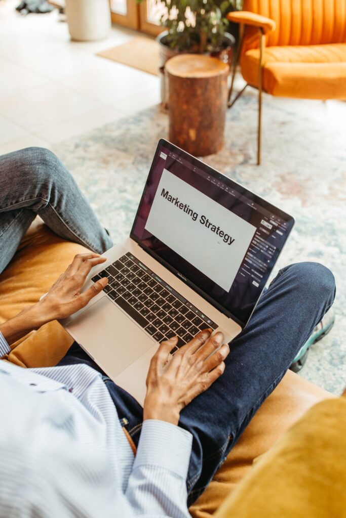 Person working on a laptop running email outreach campaigns
